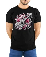 Elegant Guitar with Flowers Tee - model with hands behind back, wearing Black T-shirt and blue jeans