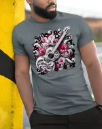 Elegant Guitar with Flowers Tee - model leaning on yellow-black pole, wearing Gray T-shirt, hand in pocket