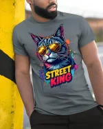 Street King Cat Graphic Tee - model leaning on yellow-black pole, wearing Gray T-shirt, hand in pocket