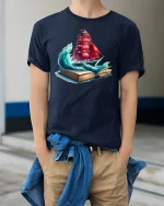 Adventure Awaits Red Sail Ship Tee - model wearing Navy T-shirt, hands in pockets, denim shirt at waist