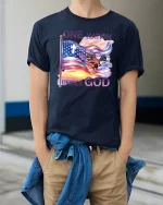 One Nation Under God T-shirt - model wearing Navy T-shirt, hands in pockets, denim shirt at waist