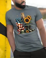 Memorial Sunflower Tee USA Veteran Tribute - model leaning on yellow-black pole, wearing Gray T-shirt, hand in pocket