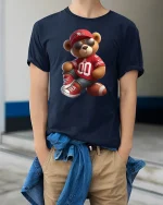 Cool Football Bear Tee - model wearing Navy T-shirt, hands in pockets, denim shirt at waist