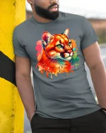 Vibrant Cougar Big Cat T-Shirt - model leaning on yellow-black pole, wearing Gray T-shirt, hand in pocket