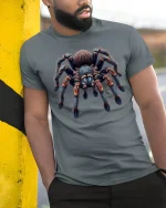 Giant Tarantula Spider Realistic Tee - model leaning on yellow-black pole, wearing Gray T-shirt, hand in pocket