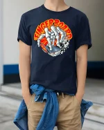 Fingerboard Skeleton Skate Tee - model wearing Navy T-shirt, hands in pockets, denim shirt at waist