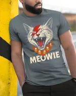 Meowie Rockstar Cat Funny T-Shirt - model leaning on yellow-black pole, wearing Gray T-shirt, hand in pocket