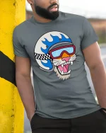 Cool Cat Biker Helmet Cartoon T-Shirt - model leaning on yellow-black pole, wearing Gray T-shirt, hand in pocket