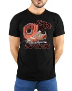 Baseball Cleats Drip Strong T-Shirt - model with hands behind back, wearing Black T-shirt and blue jeans