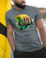 Vibrant Tropical Fish T-Shirt for Ocean Lovers Gift - model wearing grey tee, leaning on column