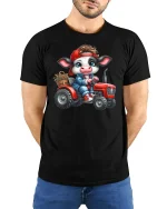 Cute Farmer Cow Riding Red Tractor Funny Graphic Tee - model wearing black tee with hands behind back