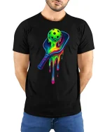 Neon Pickleball Paddle Splash Art Cool Sports Tee - model wearing black tee with hands behind back