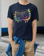Retro Boombox T-Shirt Neon 80s Music Lover Streetwear - model wearing navy tee with hands in pockets