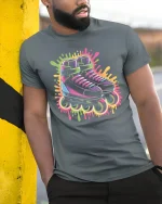 Neon Roller Skates T-Shirt Retro 80s Vibe Streetwear - model wearing grey tee, leaning on column