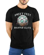 Sweet Feet Drippin’ Elite T-Shirt Funny Soccer Style - model wearing black tee with hands behind back