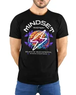 Mindset Mastery T-Shirt - Believe Achieve Greatness - model with hands behind back, wearing Black T-shirt and blue jeans
