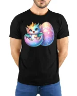 Cute Baby Dragon Hatching from Egg Fantasy Art T-Shirt - model with hands behind back, wearing Black T-shirt and blue jeans