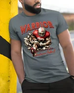 American Football Warrior Power Graphic T-Shirt - model leaning on yellow-black pole, wearing Gray T-shirt, hand in pocket