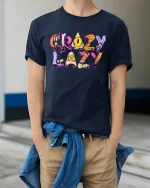 Crazy Lazy Funny Cartoon Lettering Graphic T-Shirt - model wearing Navy T-shirt, hands in pockets, denim shirt at waist