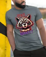Funny Raccoon Wait What Expression Graphic T-Shirt - model leaning on yellow-black pole, wearing Gray T-shirt, hand in pocket