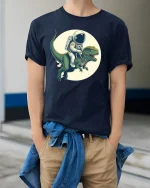 Space Explorer Dino Ride Tee - Funny Astronaut T-Shirt - model wearing navy tee with hands in pockets