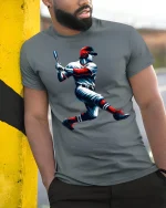 Dynamic Baseball Hitter Swing Action Graphic T-Shirt for Fans - model wearing grey tee, leaning on column