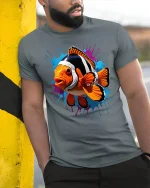 Color Splash Clownfish Graphic T-Shirt Vibrant Ocean Artwork - model wearing grey tee, leaning on column