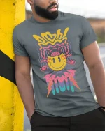 Psychedelic Smiley Brain Burst Trippy Art T-Shirt - model wearing grey tee, leaning on column