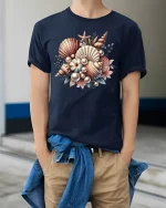 Vintage Seashell Bouquet Art Tee with Ocean Pearl Accents - model wearing navy tee with hands in pockets