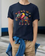 Colorful Floral Elephant with Butterflies Artistic Graphic Tee - model wearing gray t-shirt, white background, hands behind back