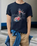Floral Music Note Art Tee for Music Lovers Elegant Tshirt - model wearing navy tee with hands in pockets