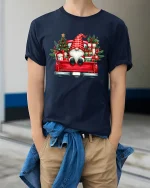 Christmas Gnome Truck Tee Festive Holiday Gifts Graphic Tshirt - model wearing navy tee with hands in pockets