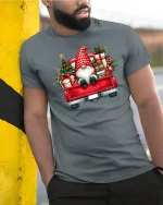 Christmas Gnome Truck Tee Festive Holiday Gifts Graphic Tshirt - model wearing grey tee, leaning on column