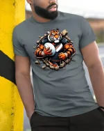 Fierce Tiger Football Player Breakthrough Power T-Shirt - model wearing grey tee, leaning on column