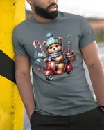 Christmas Teddy Scooter Ride Tee with Candy Cane and Gifts - model wearing grey tee, leaning on column