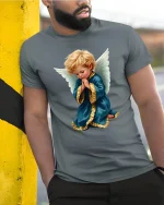 Praying Angel Child Art Tee With Peaceful Spiritual Feeling - model wearing grey tee, leaning on column
