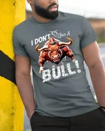 I Dont Give A Bull Bold Attitude Graphic Tee With Power Art - model wearing grey tee, leaning on column