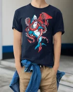 Shark Vs Squid Battle Graphic Tee With Bold Ocean Creature Art - model wearing navy tee with hands in pockets