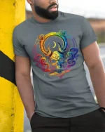 Rainbow Mystic Skull Art Graphic Tee With Colorful Cosmic Style - model wearing grey tee, leaning on column