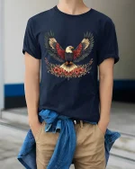 Majestic Bald Eagle Wings Floral Art Freedom Graphic Tshirt - model wearing navy tee with hands in pockets