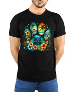 Tropical Dog Mom Paw Print Floral Beach Art Graphic Tshirt - model wearing black tee with hands behind back