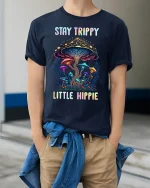 Stay Trippy Little Hippie Psychedelic Mushroom Art Tee - model wearing navy tee with hands in pockets
