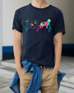 Colorful Dog Heartbeat Love Paw Print Tie Dye Graphic Tee - model wearing navy tee with hands in pockets