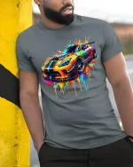 Color Splash Supercar Art Tee With Bold Street Racing Energy - model wearing grey tee, leaning on column