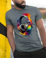 Vibrant Splash Headphones Art Tee for Music Lovers T-Shirt - model wearing grey tee, leaning on column