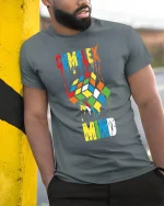 Complex Mind Melting Puzzle Cube Art Tee Creative Graphic Shirt - model wearing grey tee, leaning on column