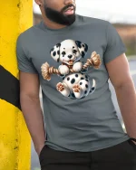 Cute Spotted Puppy Tug Rope Graphic Tee Fun Playful T-Shirt - model wearing grey tee, leaning on column