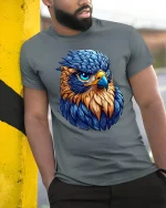 Fierce Blue Hawk Art Tee Bold Colorful Bird Graphic T-Shirt - model wearing grey tee, leaning on column
