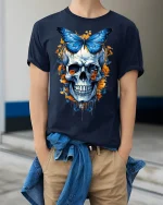 Blue Butterfly Skull Tee Floral Gothic Art Graphic Tshirt - model wearing navy tee with hands in pockets
