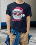 Funny Merry Snowman Tee with Santa Hat Cool Holiday Tshirt - model wearing navy tee with hands in pockets